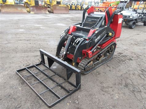 toro stand on skid steer